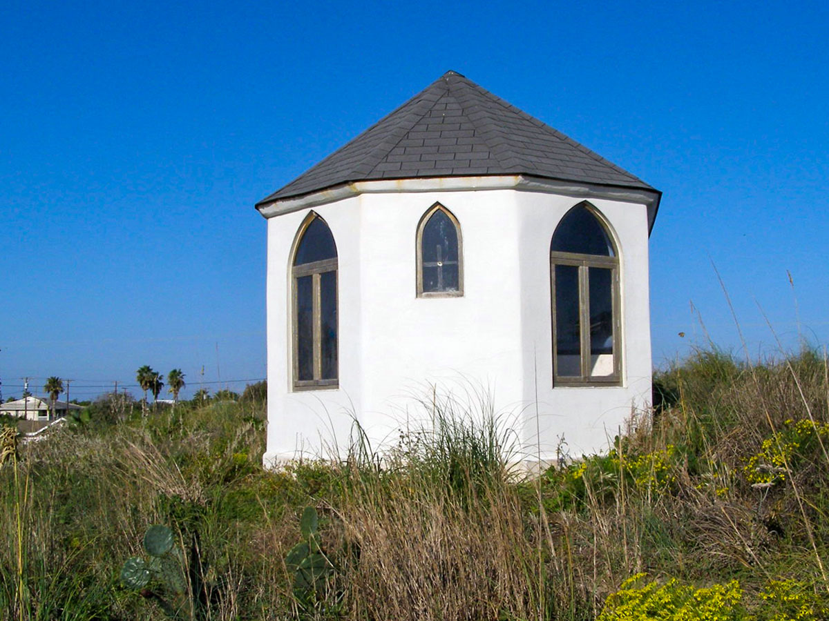 Chapel on the Dunes with a clear blue sky.