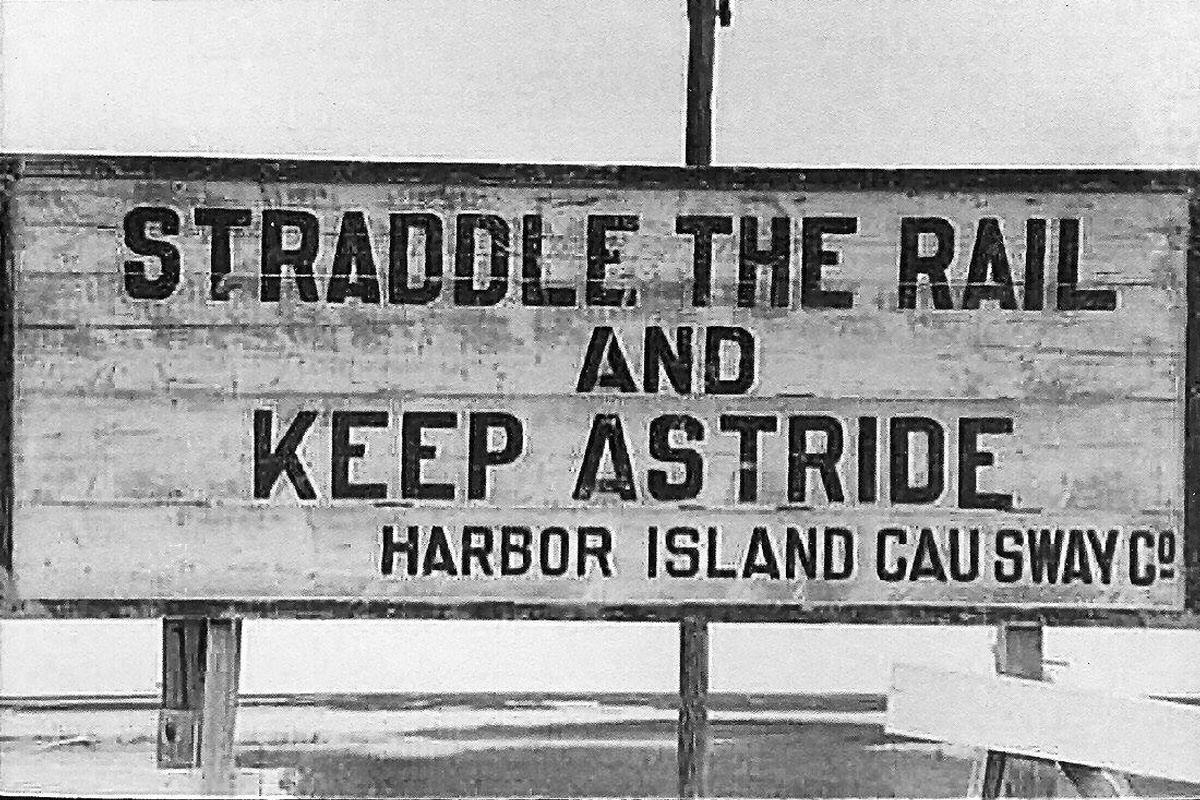 Sign - Straddle the Rail and Keep Astride. Harbor island Causeway Co.