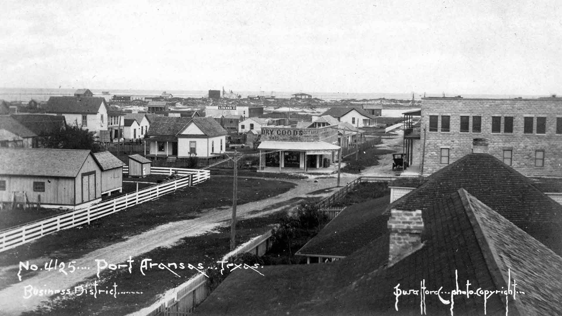 Old black and white photo of the Port A Business District