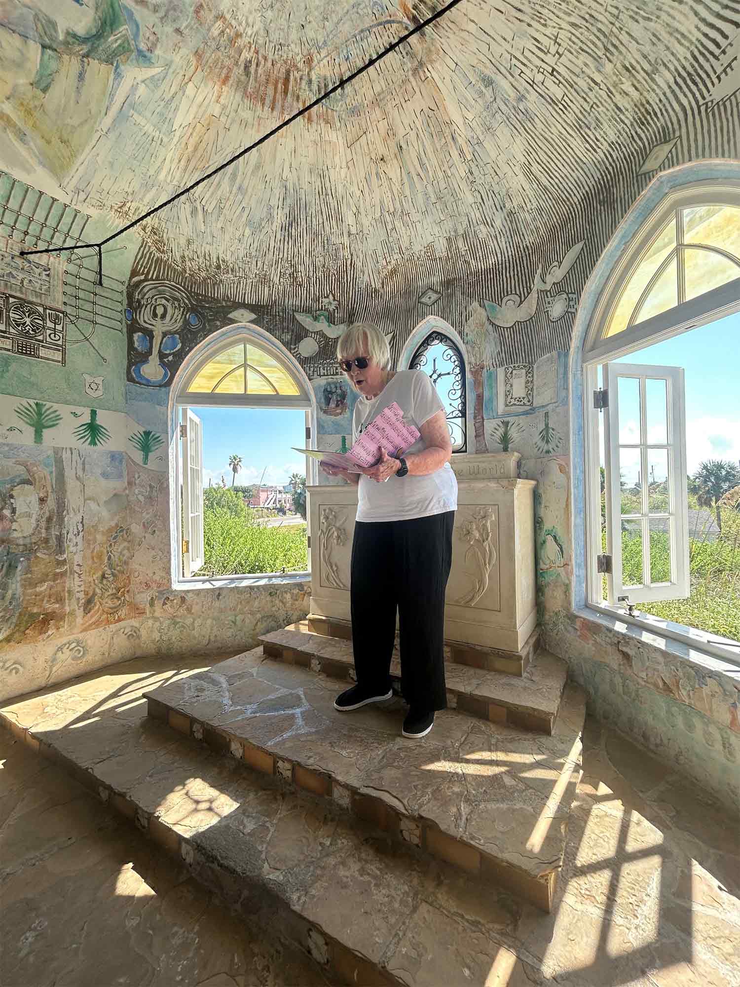 Ann Studeman singing inside the Chapel on the Dunes